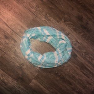 Blue and white infinity scarf.